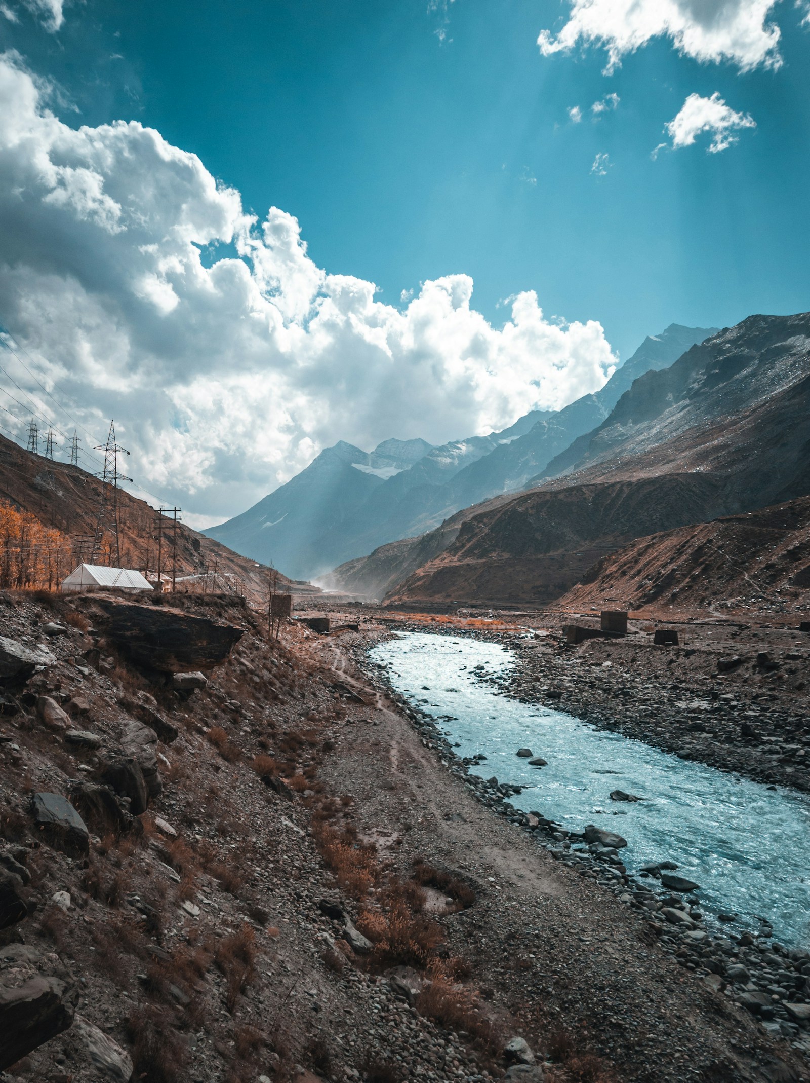 A river running through a rocky mountain valley at Sissu in Lahaul and Spiti.
