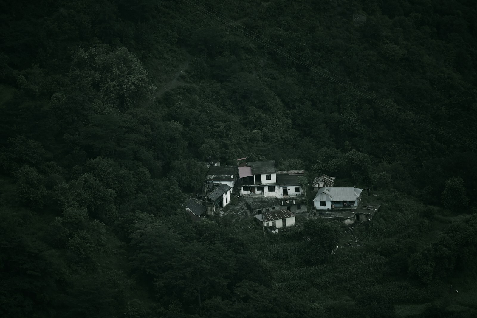 A village among green hills in Chamba, Himachal Pradesh.