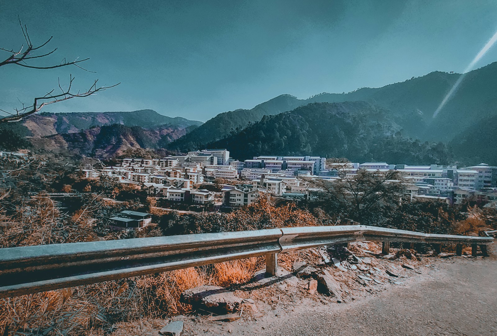 Mandi town with mountains rising in the background.