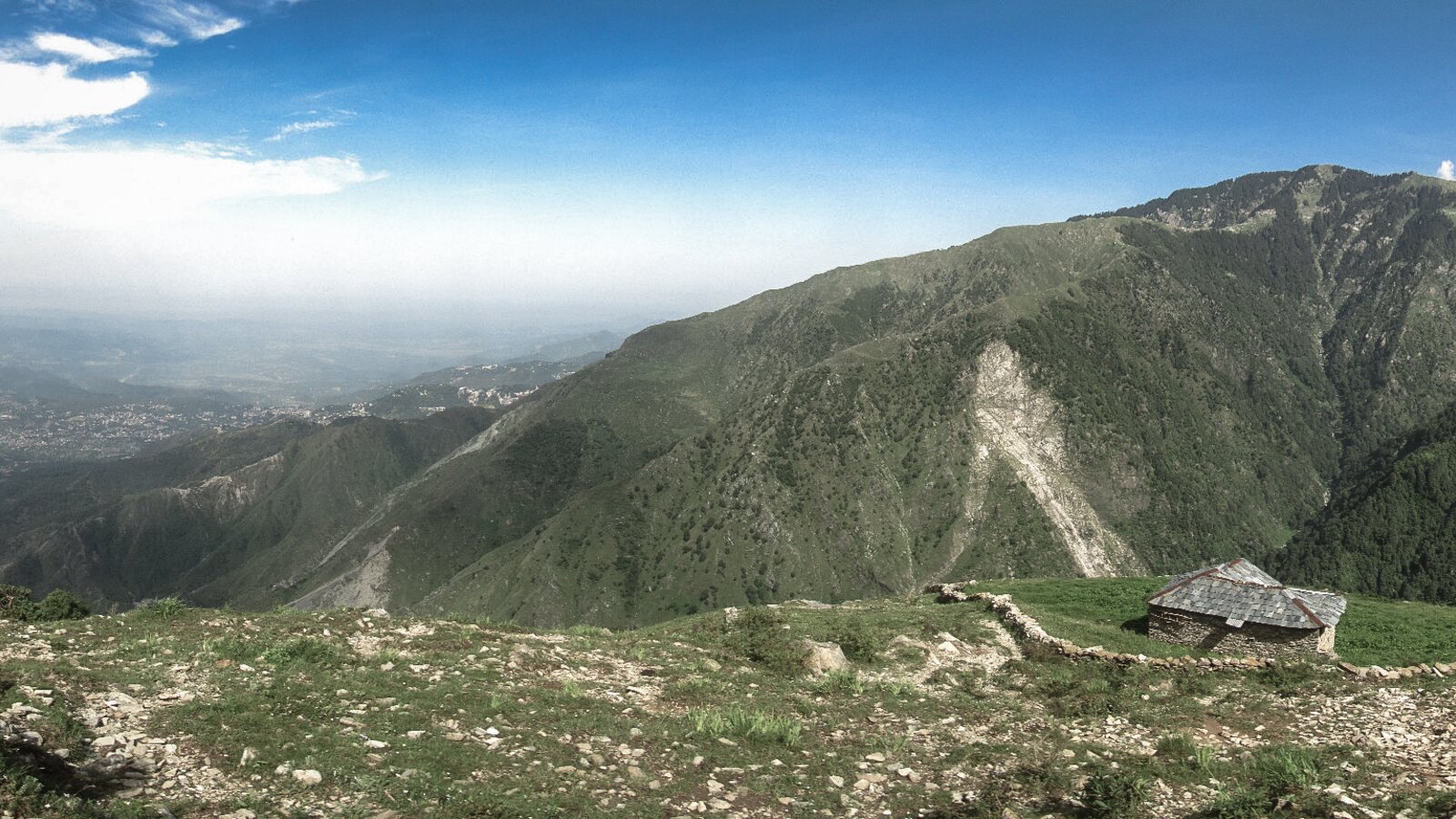 Dharamshala and the Dhauladhar mountains viewed across the valley.