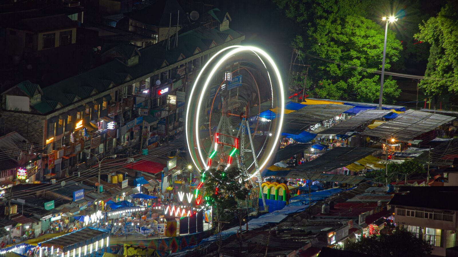 The 2023 Minjar Mela fairground in Chamba at night.